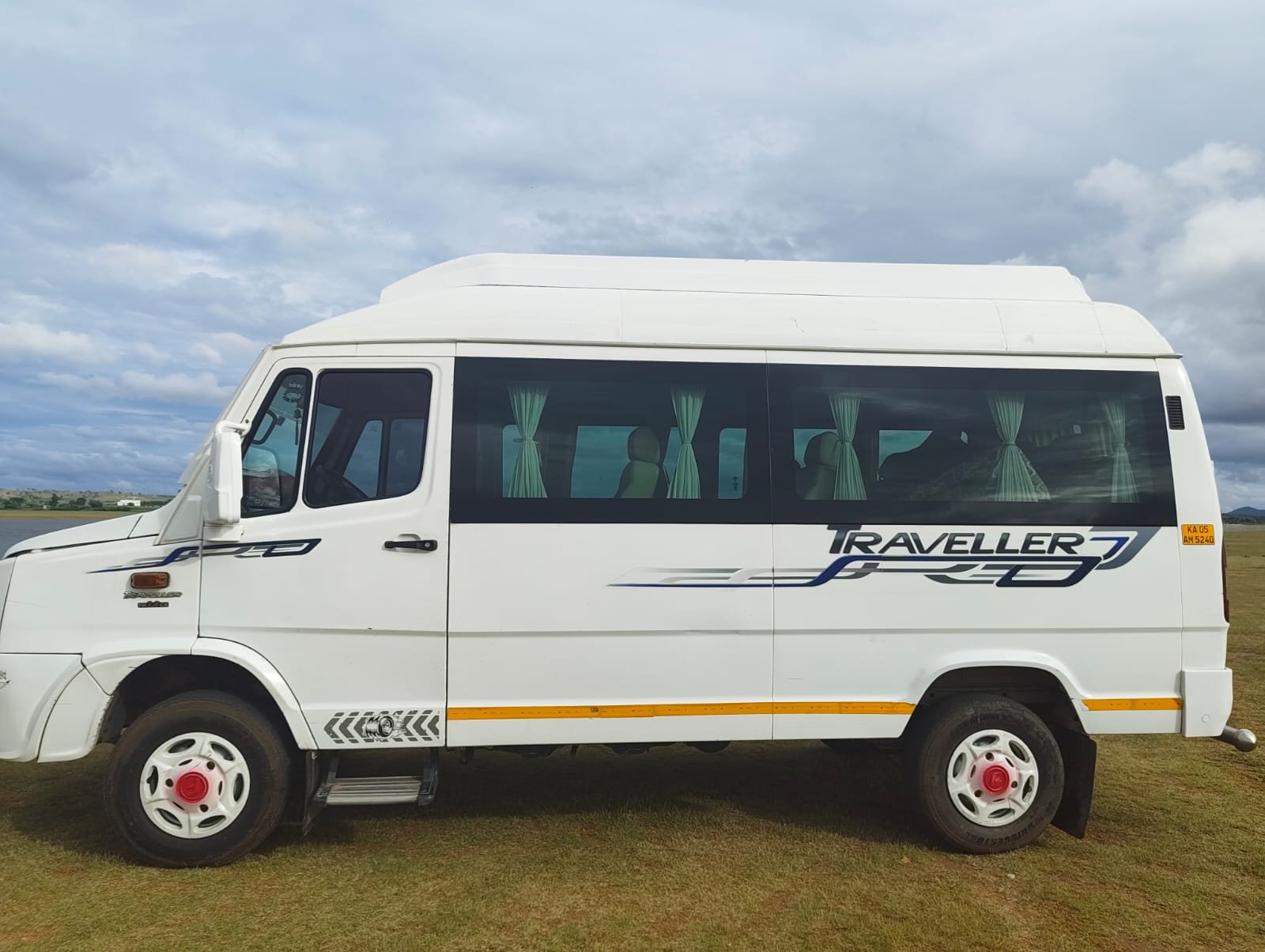 9-Seater Tempo Traveller